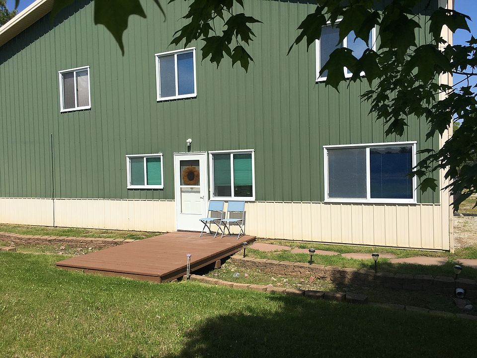 Front door facing west and the pond.
