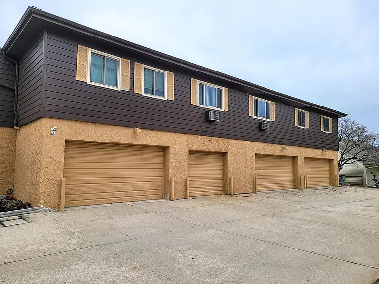 Front of the building. Unit #4 is above the garages. Please note, GARAGE IS NOT INCLUDED IN THIS RENTAL