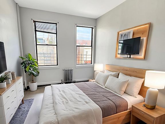 1ST BEDROOM (STAGED)