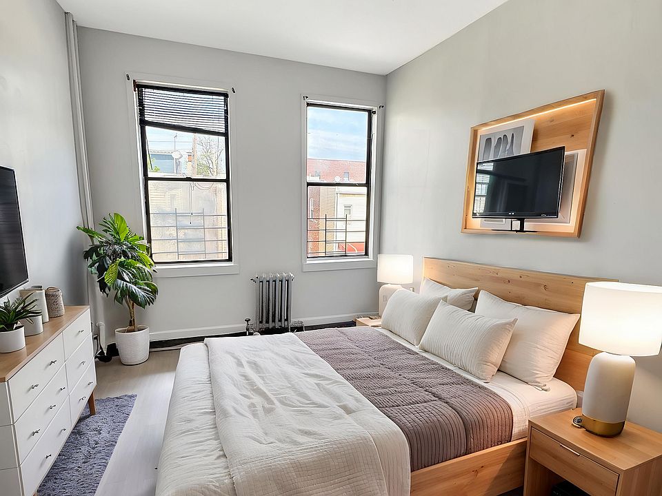 1ST BEDROOM (STAGED)