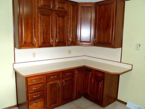Kitchen conters; cherry cabinetry