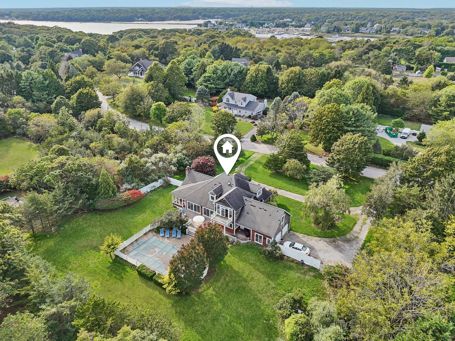 A captivating aerial perspective showcasing the property’s rear elevation.