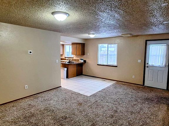 Family room, dining area and back door