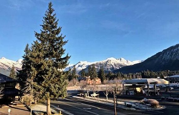 Centrally located. Across the street to the right: Safeway gas, grocery, liquor, deli, plus banks, other stores, restaurants, schools, post office, recreation areas. To the left: Mendenhall River with trails.