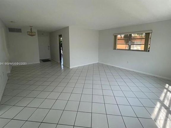 2nd image of 1020 94th St APT 203