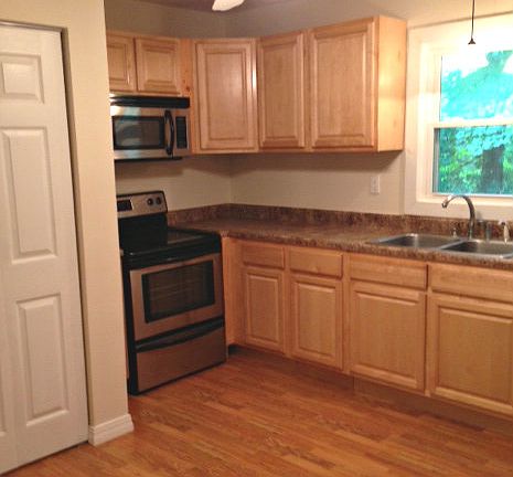 Updated kitchen w/maple cabi