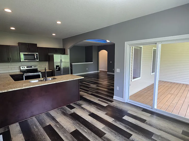 Kitchen, Living Room and Covered Deck from Dining Room