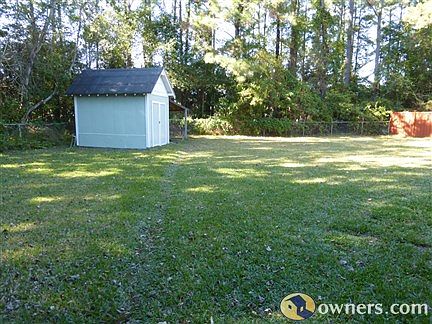 Backyard view of shed