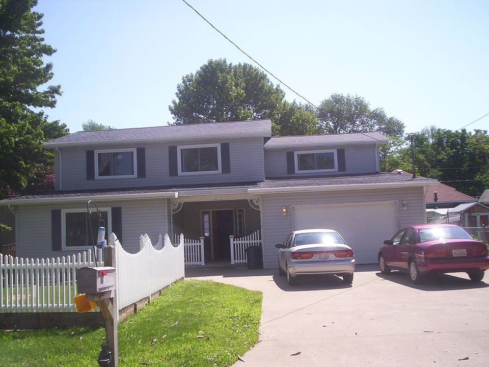 New roof, new windows, new  flooring - main floor fully ceramic tiled.