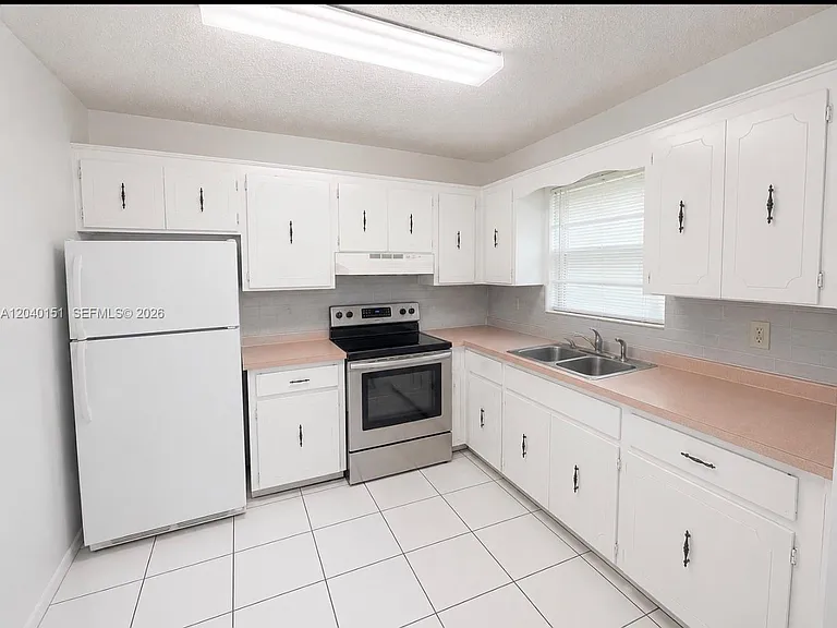5771 SW 36th Ct #301 — Photo 1