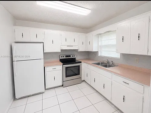 5771 SW 36th Ct #301 Photo 1