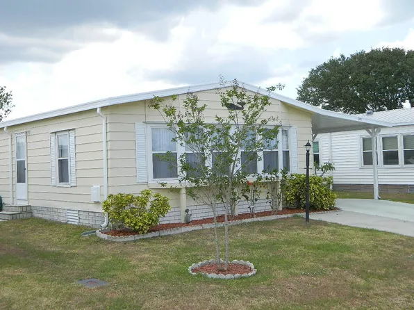 707 Amaryllis Dr, Barefoot Bay, FL 32976