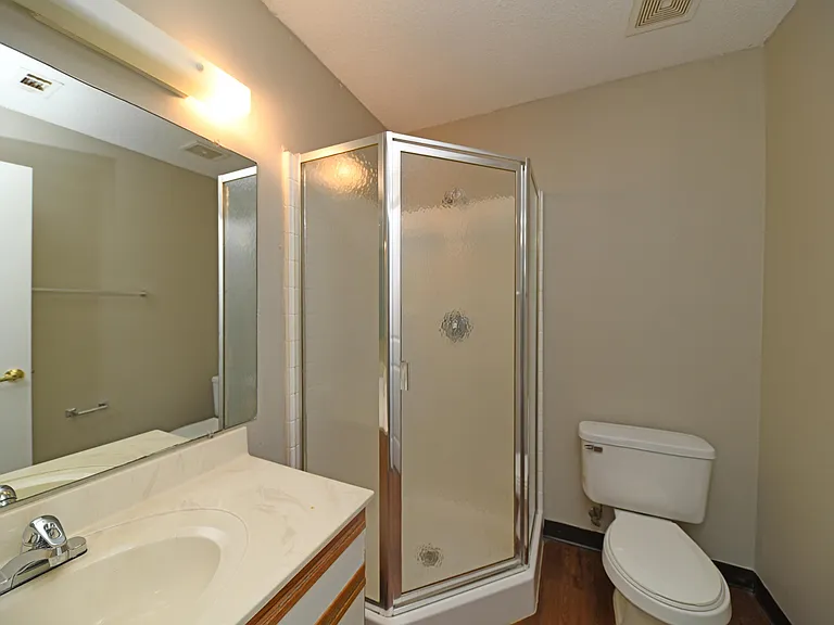 Bright bathroom with stand up shower