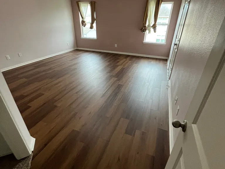 Master bedroom suite with large closet space and large bathroom.