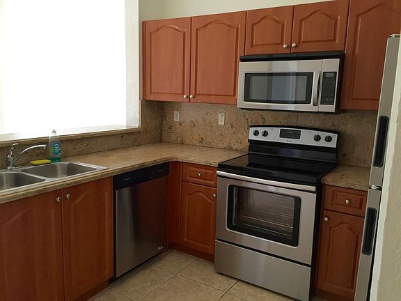 Updated Kitchen with Stainless Steel Appliances and marble c