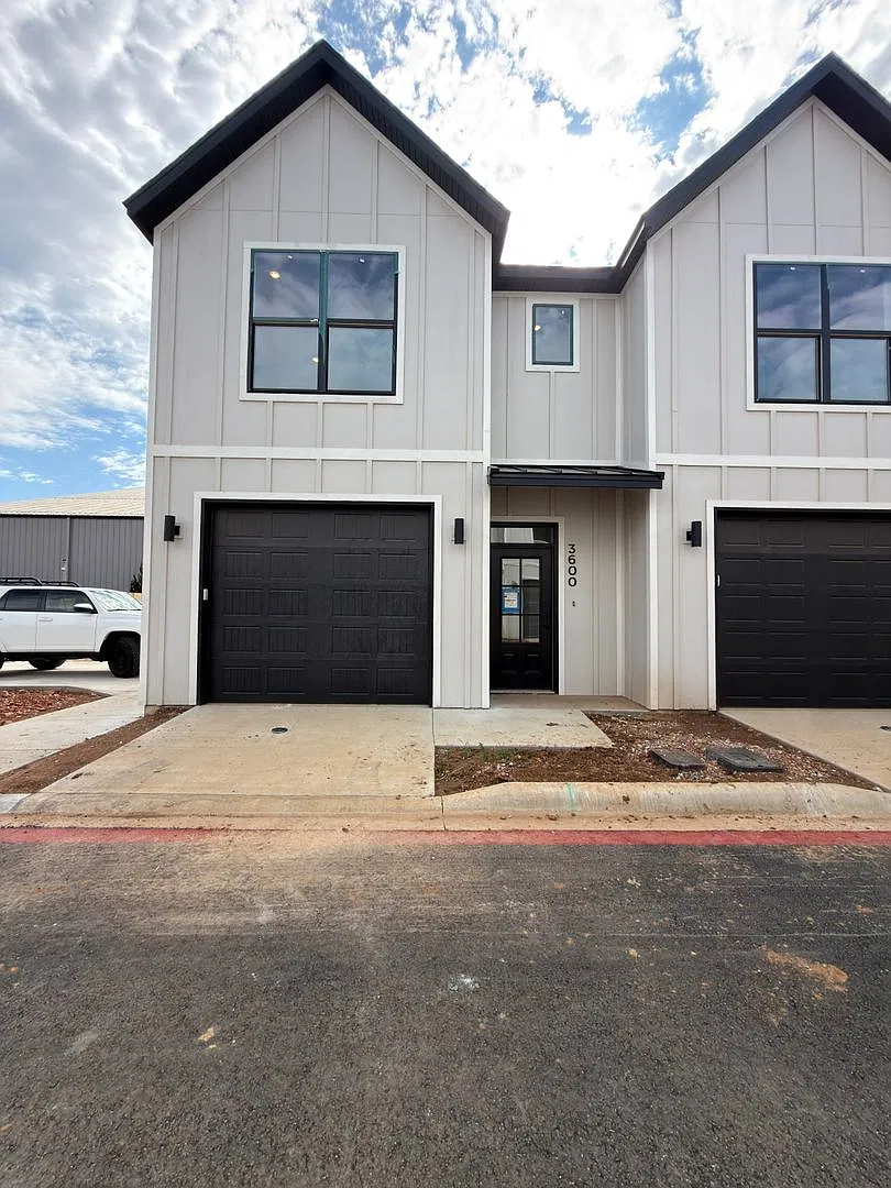 Brand-New 3-Bedroom Townhome in Rogers | Attached Garage + Internet Package — Photo 1