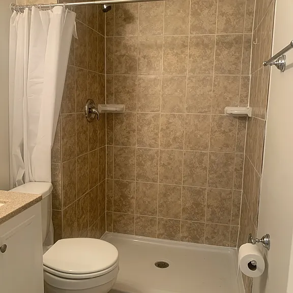 Ground level bedroom with full bath