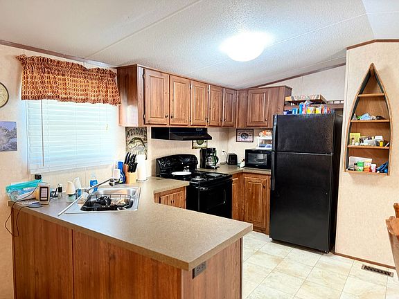 5th image of 1613 Shadows Rd