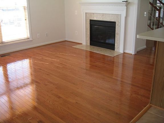 Den with fireplace off kitchen