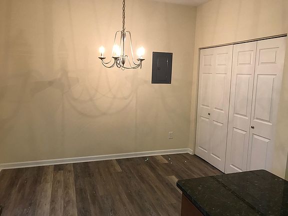 Large eating area --new flooring and lighting!  Laundry room