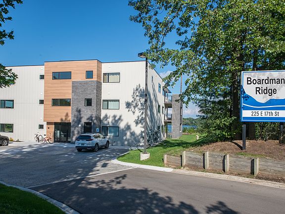 A small condo complex located in a quiet neighborhood on the Boardman Lake Loop Trail