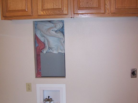 laundry room with hookups