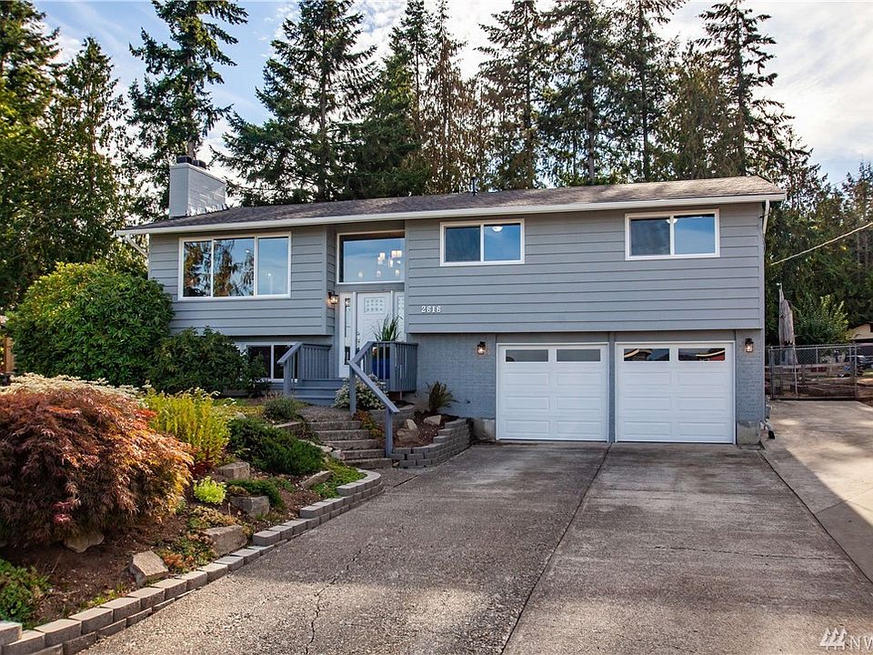 Magnificently remodeled mid-entry home in prestigious (and scenic) Driftwood Point, with mountain and lake views, situated in the superb Dierenger school district.  The home is nicely set back from the street, and has a new roof, fresh paint, new vinyl windows throughout.