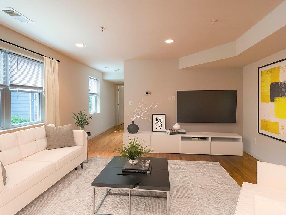 Living area with open floor plan. Virtually staged.