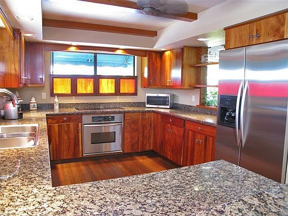 Cook's kitchen-granite, stainless, koa wood