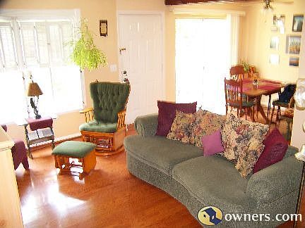Brightly Open Living/Dining Room with Patio Sliding Glass Door