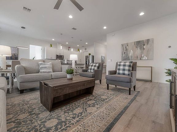 Modern design with vaulted ceilings and open floorplan.