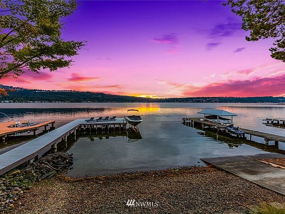 No bank waterfront with your own private dock and rare boat launch