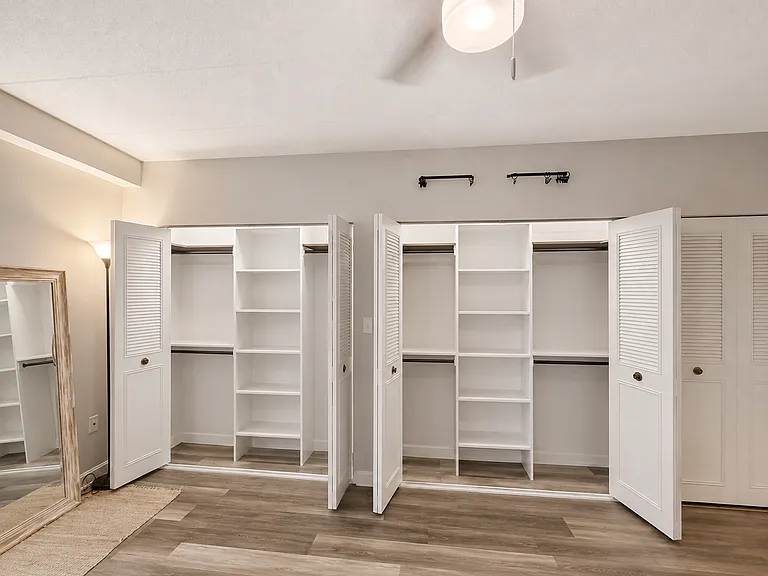 plenty of closet space for 2 people with a bathroom closet on the right