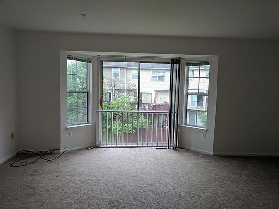 Living room with bay windows