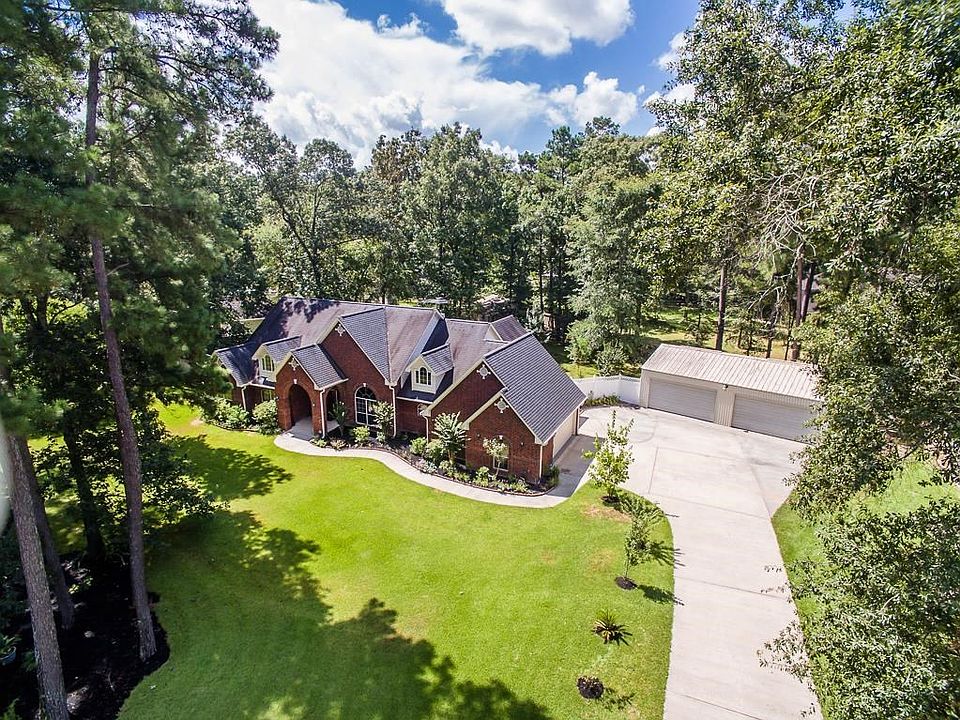 This spacious home offers lots of space both inside and out.
