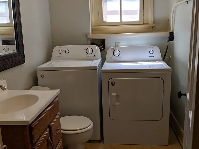downstairs 1/2 bath with laundry
