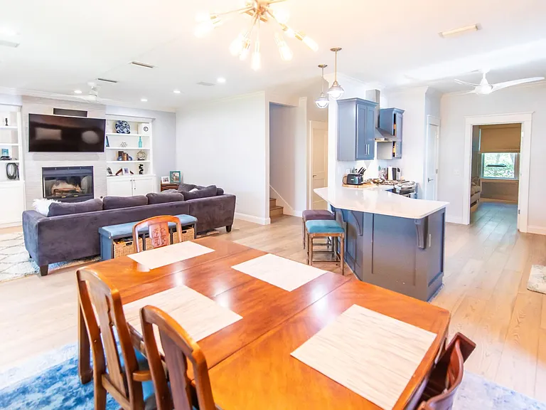 Plenty of seating to entertain with a dining table and a breakfast bar