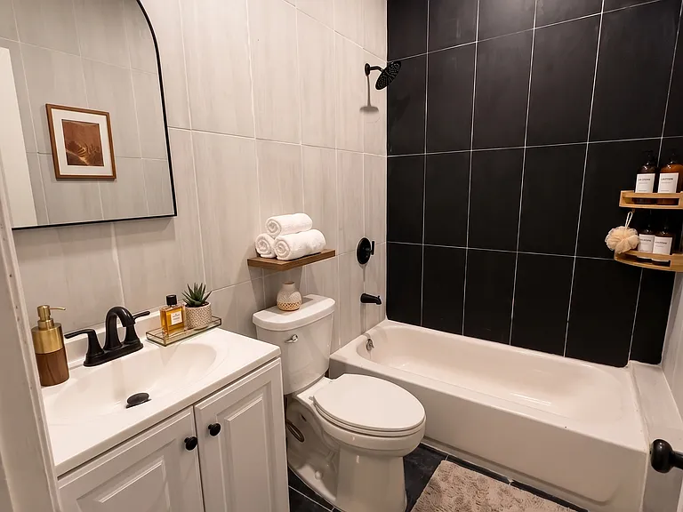 Bathroom- This room has been virtually staged using AI to help visualize its layout and design potential.