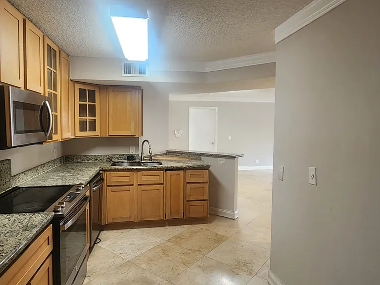 8871 Wiles Rd — Photo 24