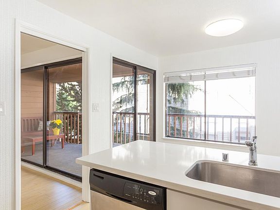 Kitchen/Dining out to center atrium