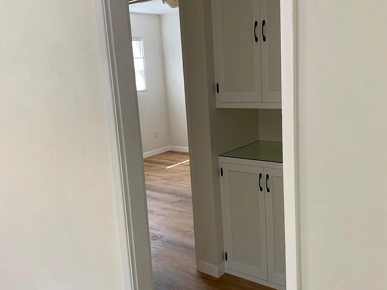 Living room to southwest bedroom.