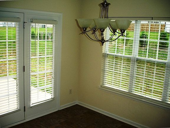Cheerful, Sunny & Spacious is this Sunroom and/or Formal Dining Area. 