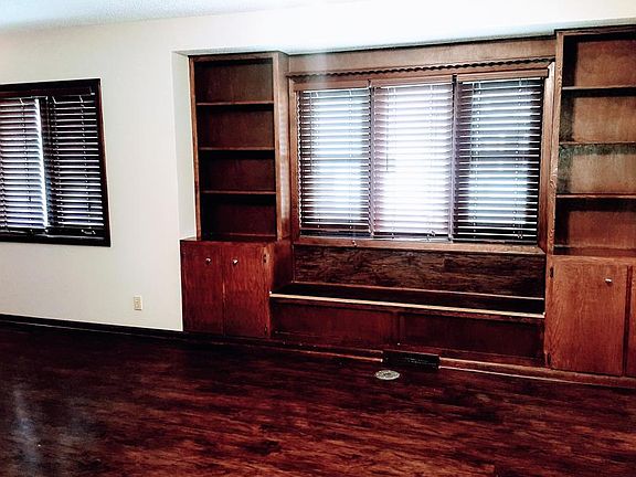 Living area with built in shelves