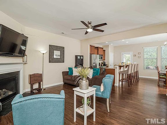 Gas logs fireplace! Wide plank laminate hardwoods throughout the first floor!