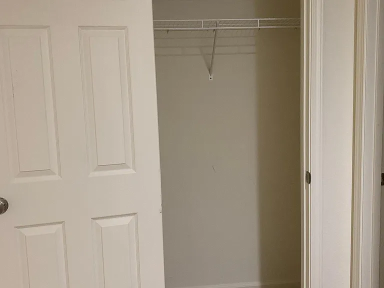 Hallway closet next to the laundry room
