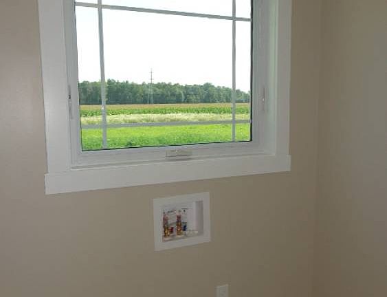 Main floor laundry just off the kitchen.
