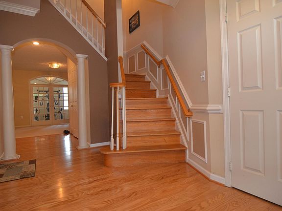 Wood floors entrance, stairs and all main level.