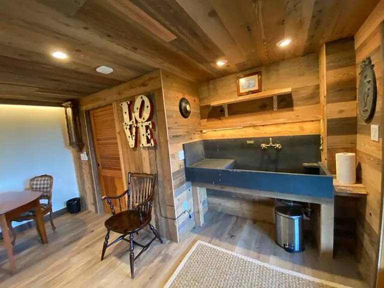 Soapstone sink niche with red oak shelving