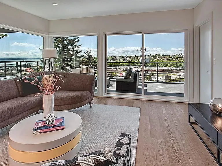 Wall of windows, large top deck, and beautiful panoramic views.