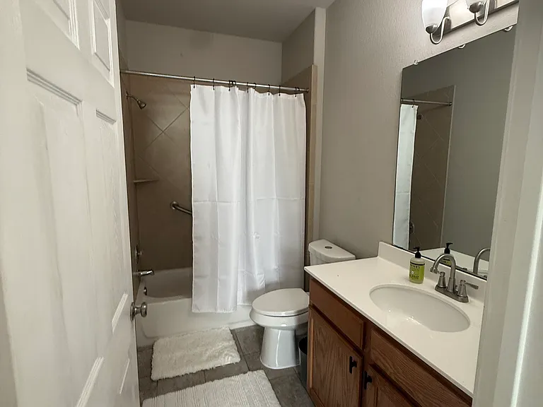 COMBO shower/tub/tile bathroom with new faucet & NEW elongated toilet..